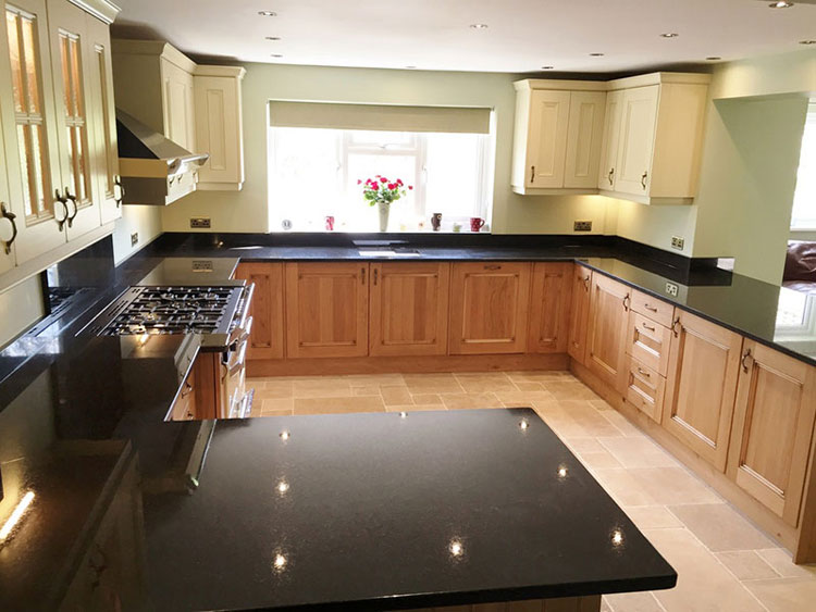 black pearl granite with honey oak cabinets